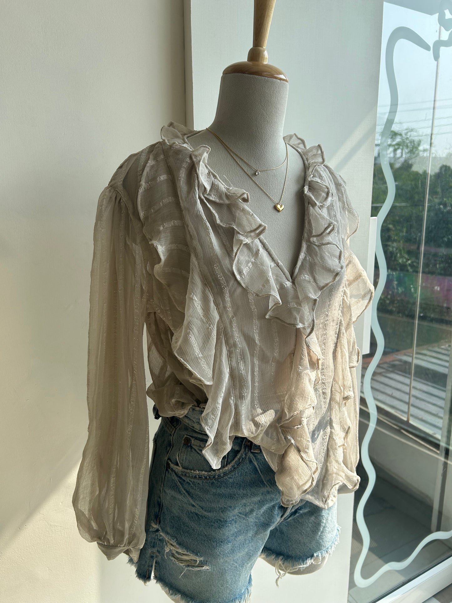 Sheer long sleeve ruffle top