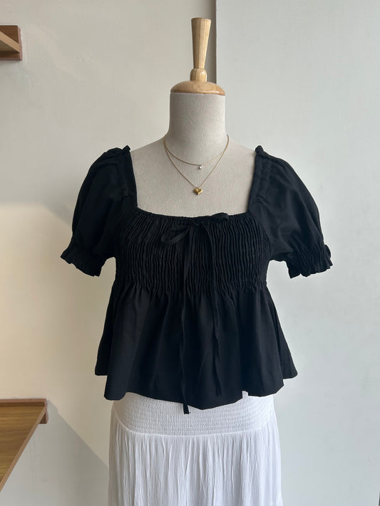 Black smocked peplum top