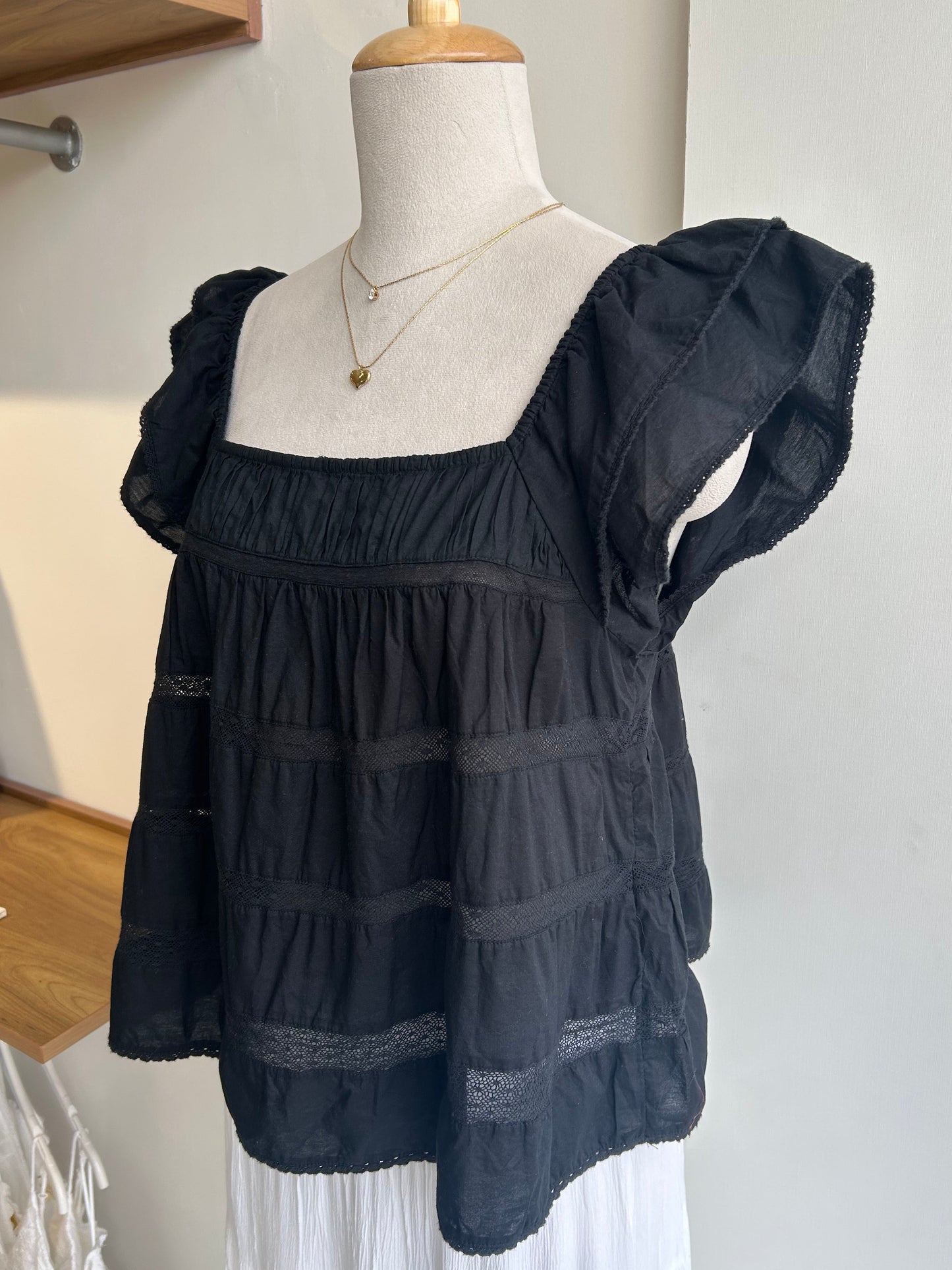 Black ruffled sleeve top