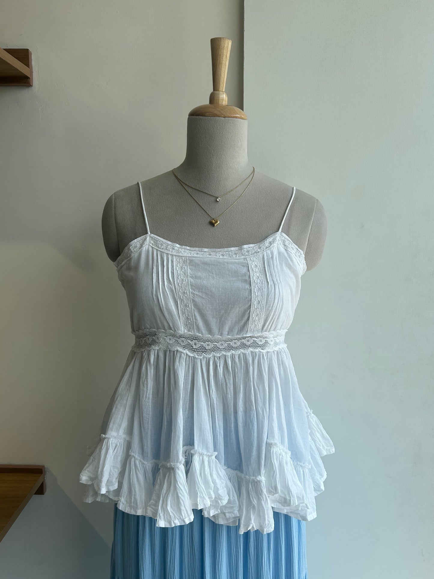 White peplum top