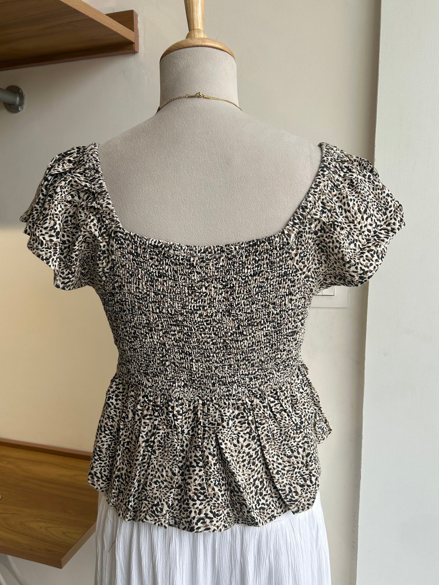 Japna animal print peplum top