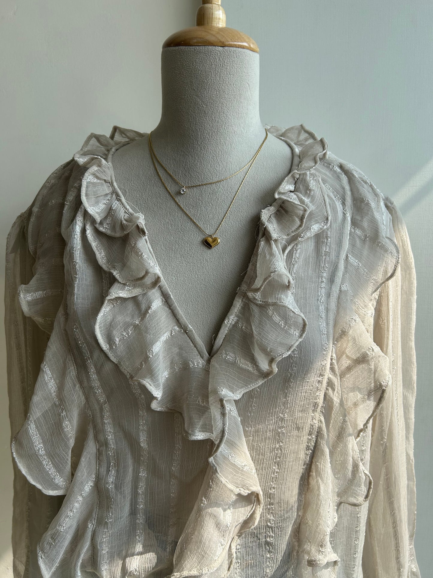 Sheer long sleeve ruffle top