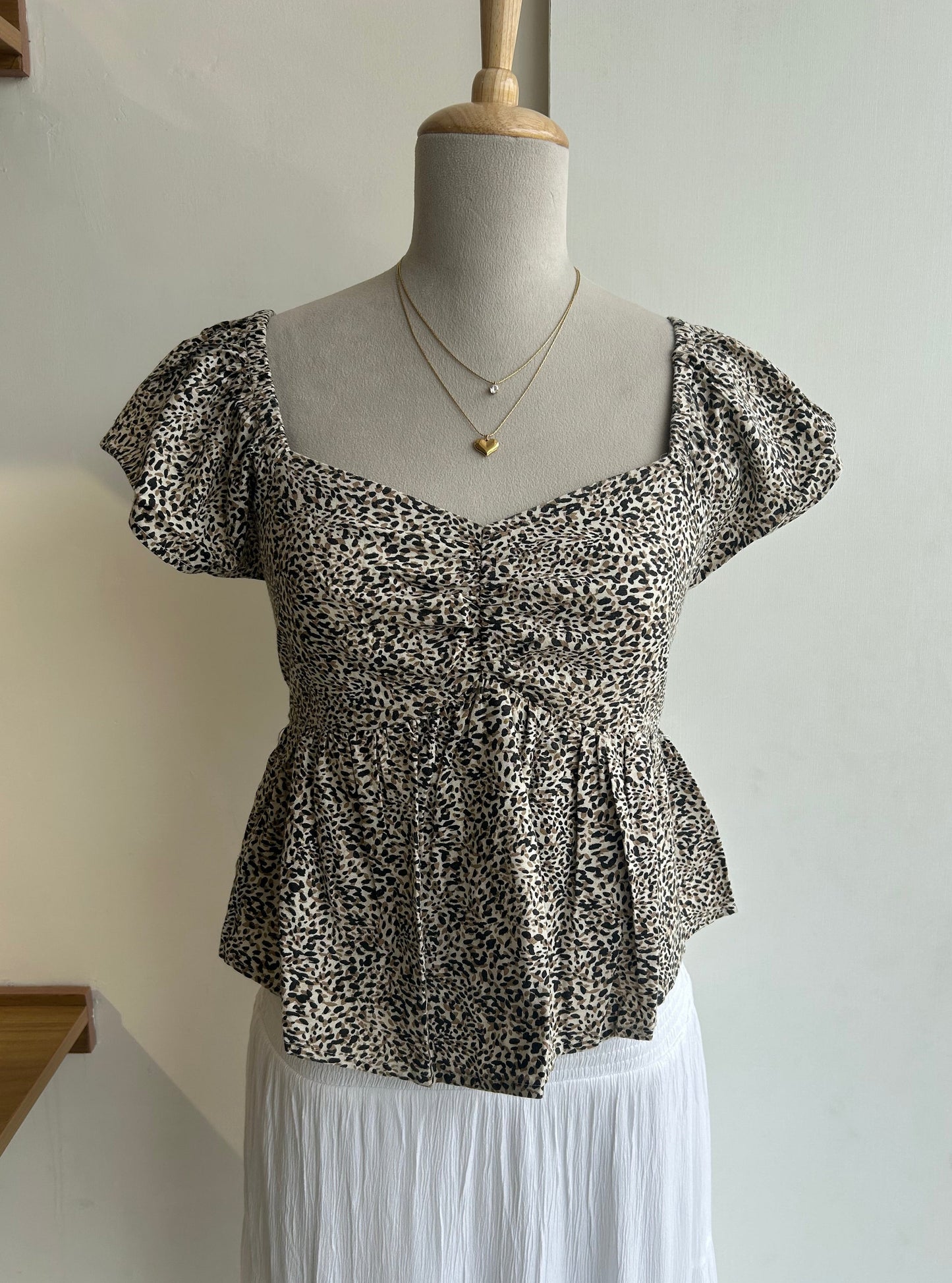 Japna animal print peplum top