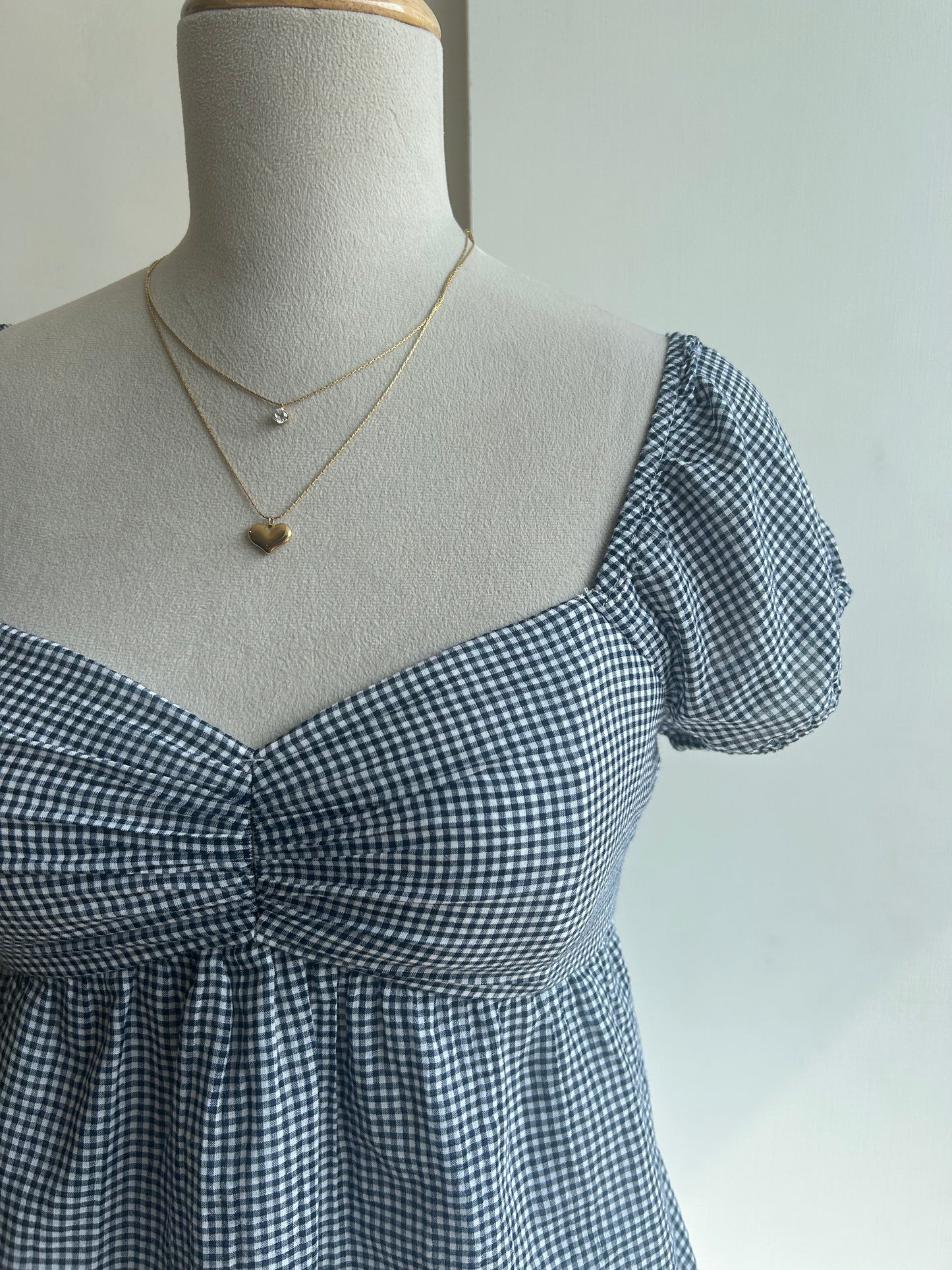 Black check peplum top