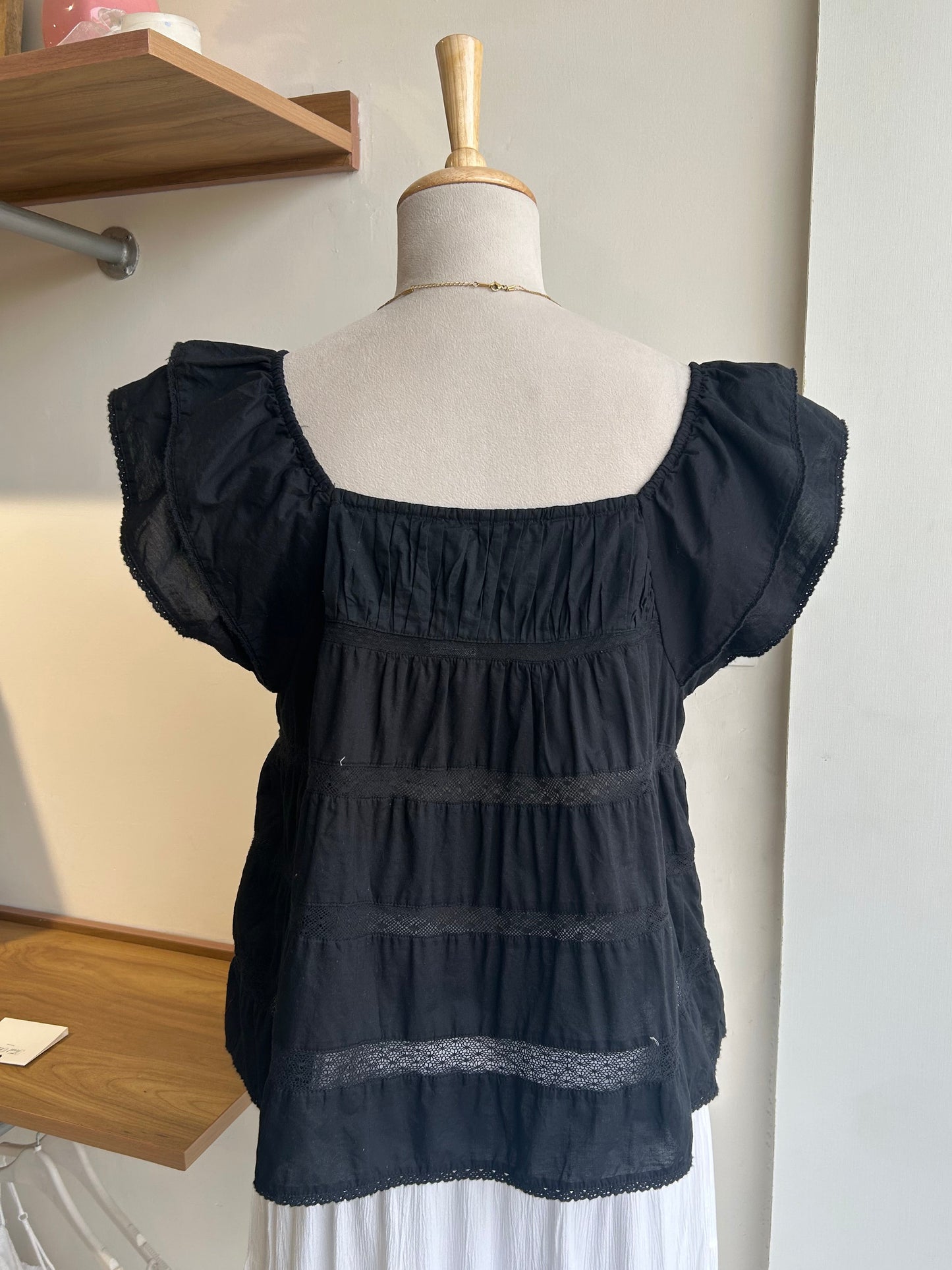 Black ruffled sleeve top