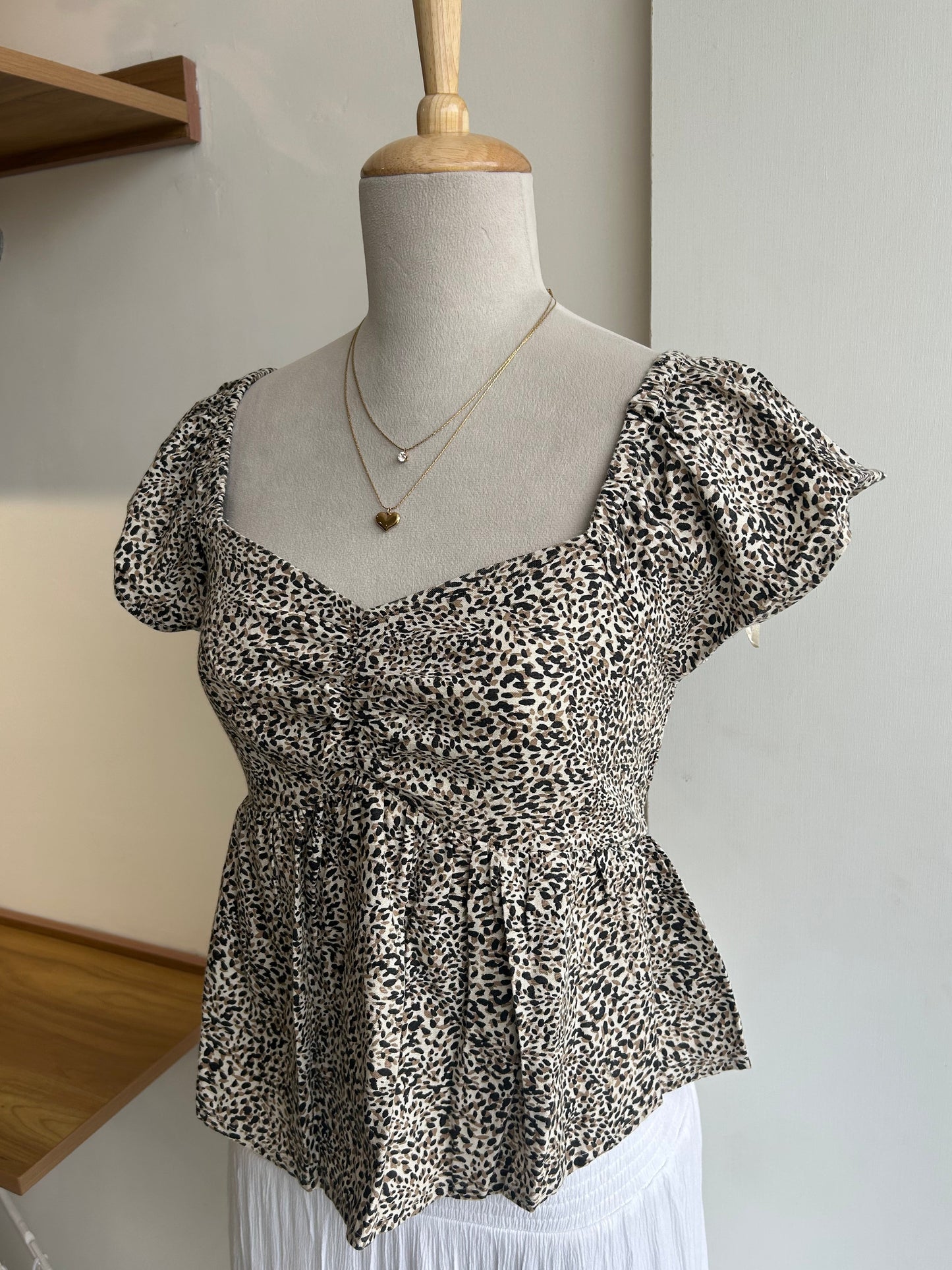 Japna animal print peplum top