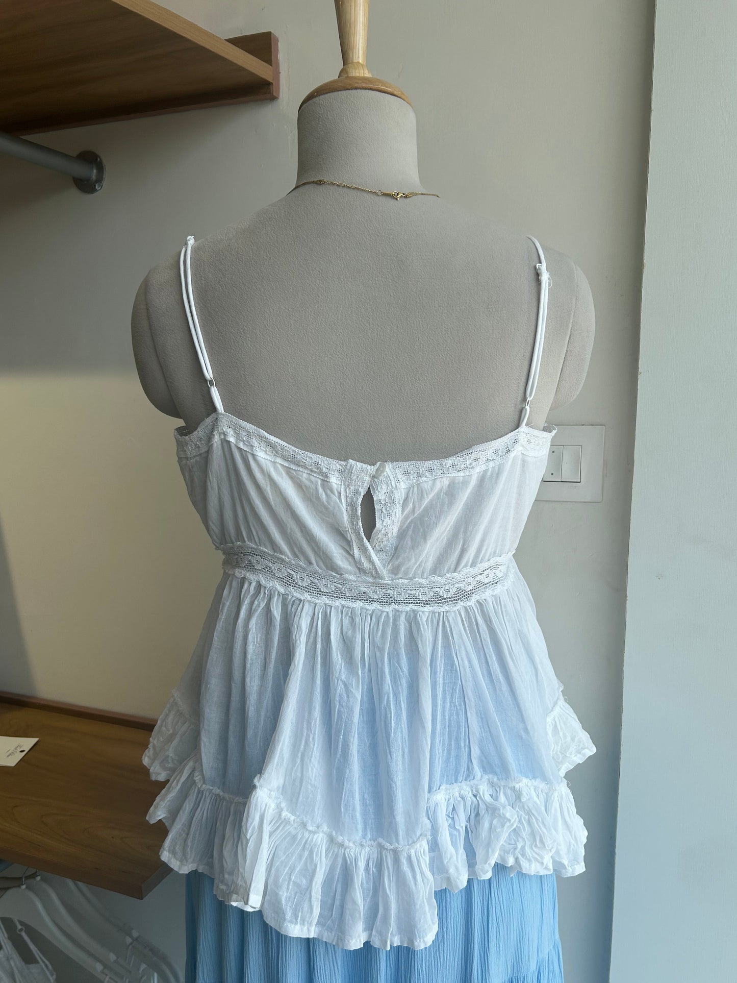 White peplum top