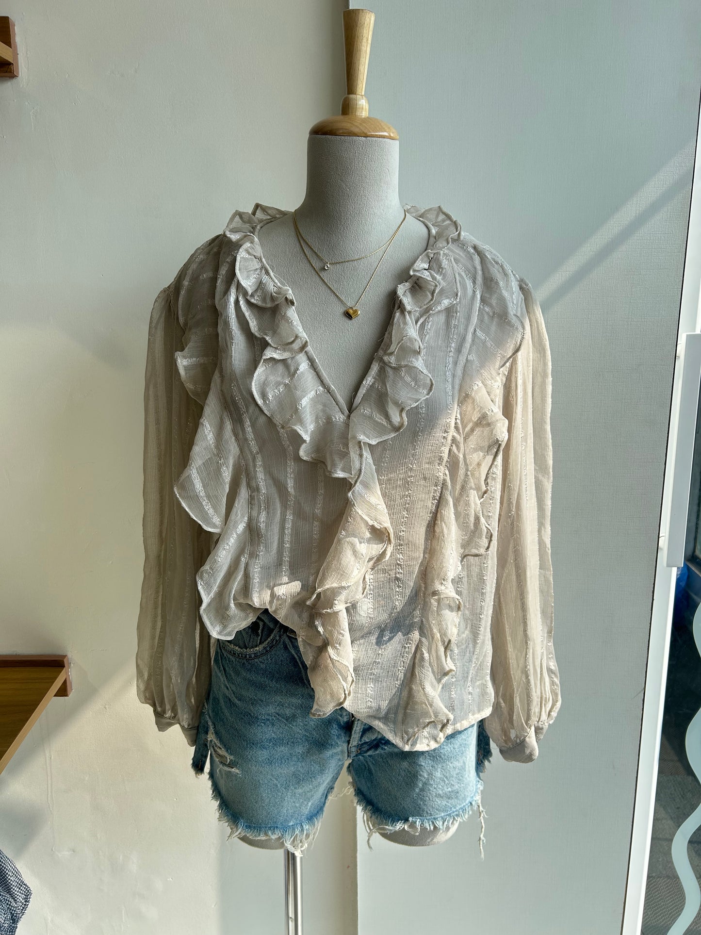 Sheer long sleeve ruffle top